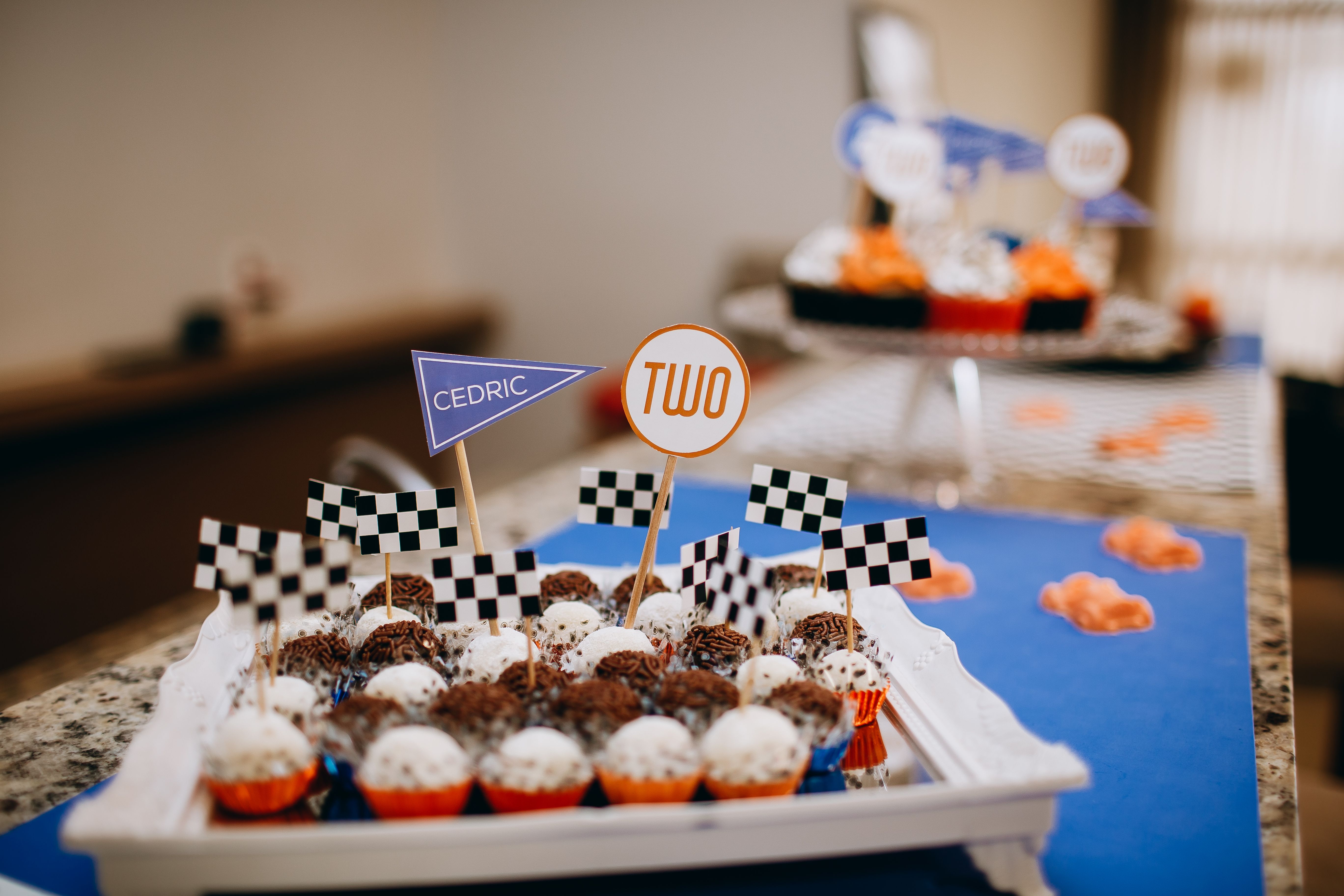 Delicious homemade sweets with birthday decorations for a two-year celebration indoors.