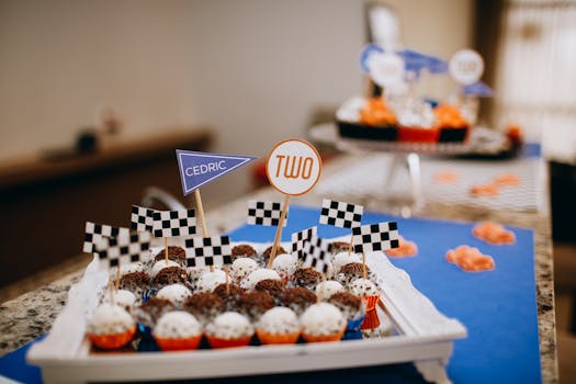Delicious homemade sweets with birthday decorations for a two-year celebration indoors.