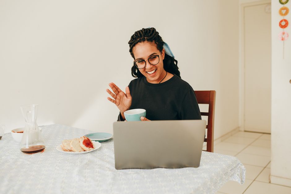 Photo by Helena Lopes on Pexels Woman on a phone video visit with a telehealth provider at her kitchen table