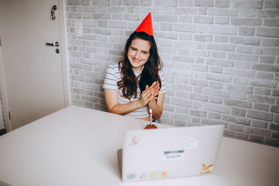Strategist celebrating a birthday over video with a paper hat — photo by Helena Lopes on Pexels