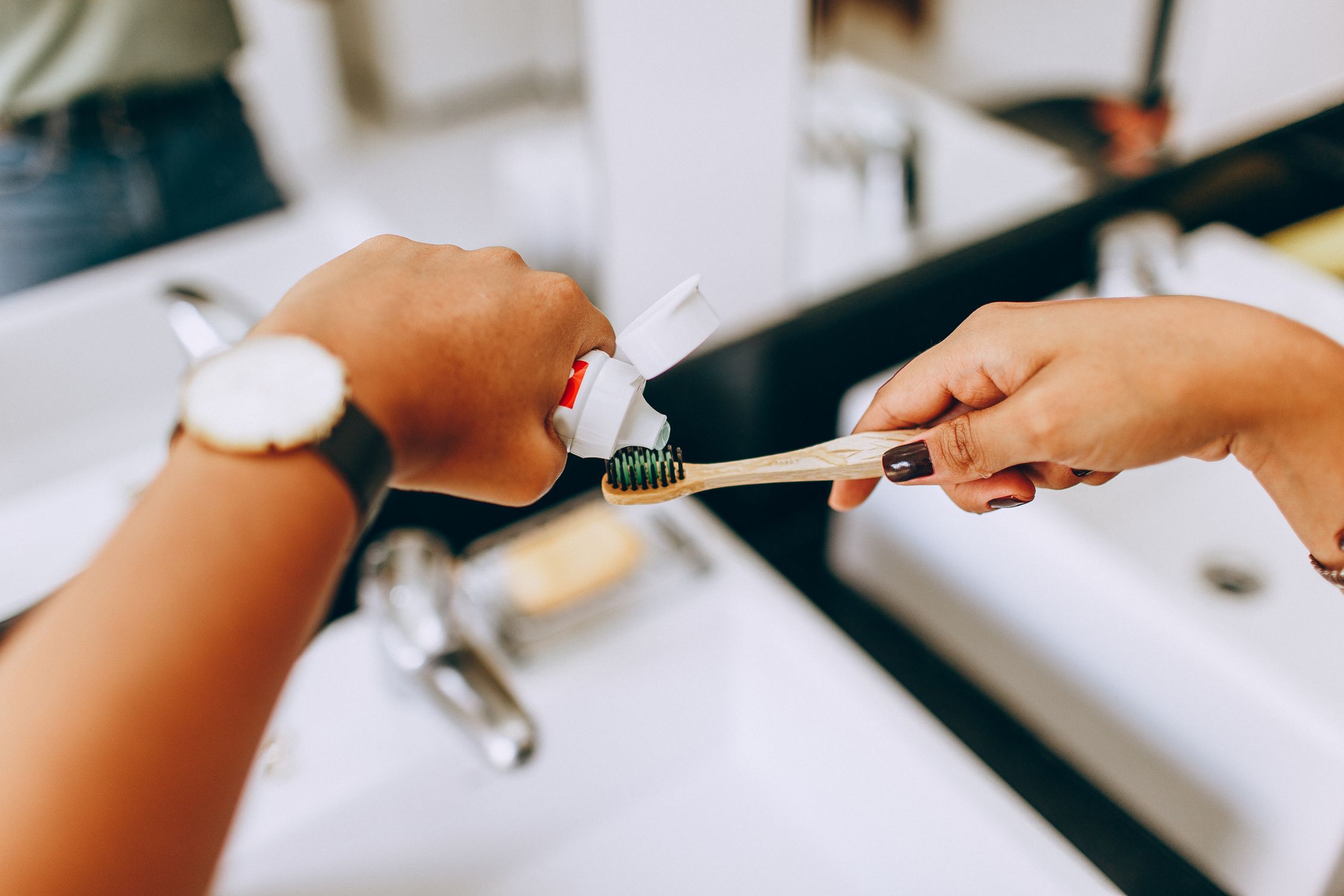 Hot Toothbrush Toothpaste Add Woman Putting Toothpaste on Toothbrush · Free Stock Photo