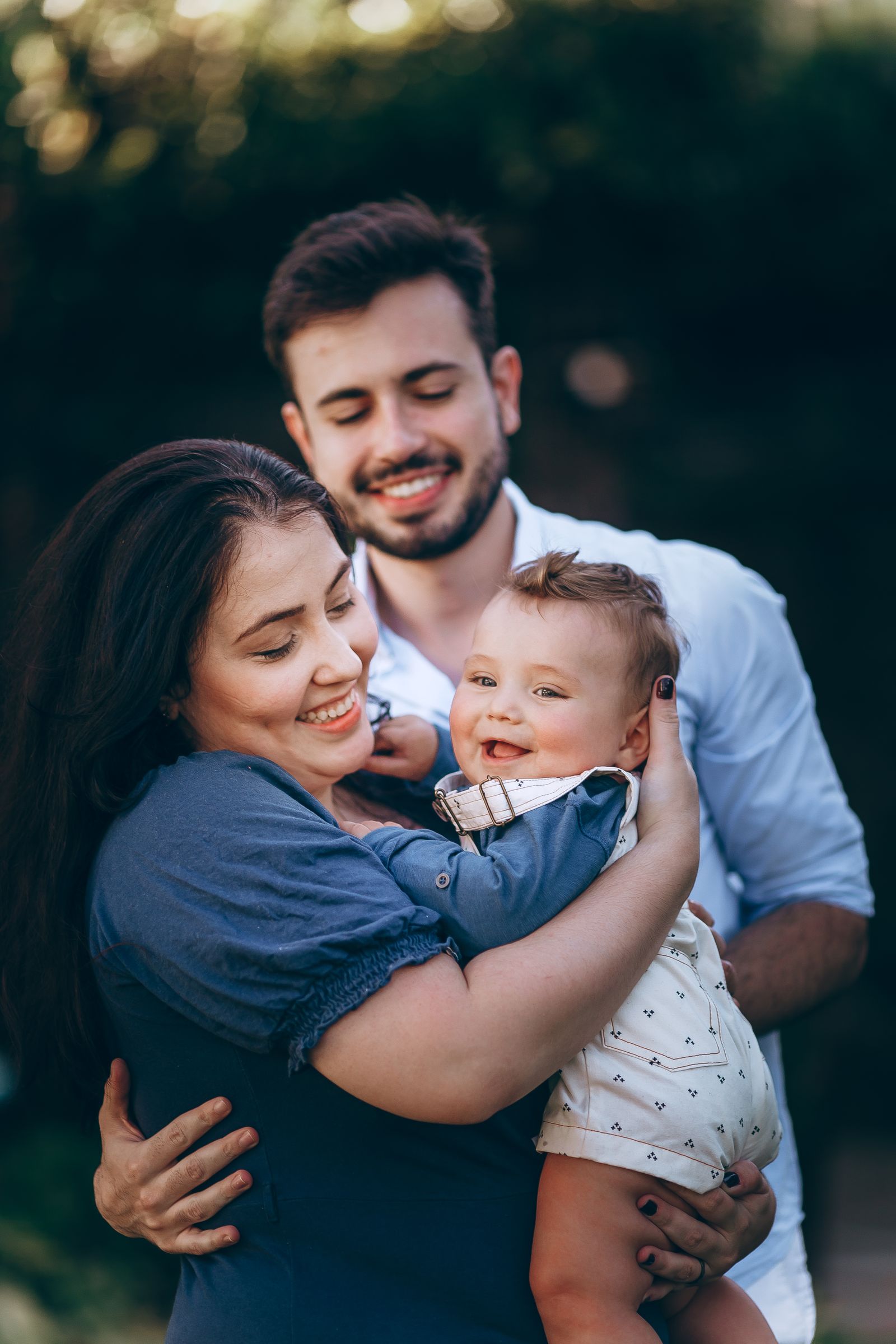Happy couple with smiling baby