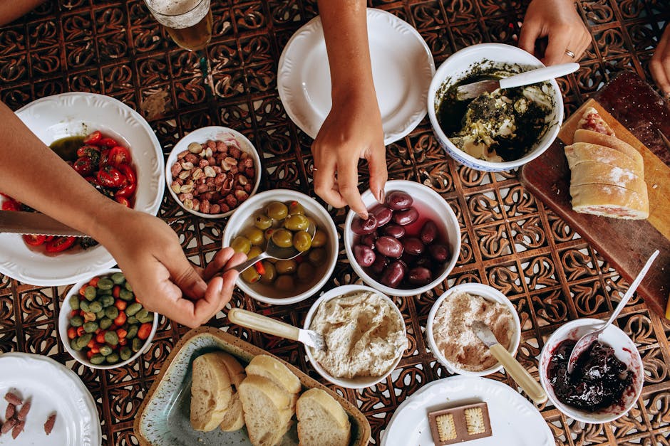 Family-style Chinese meal with lazy Susan and shared dishes