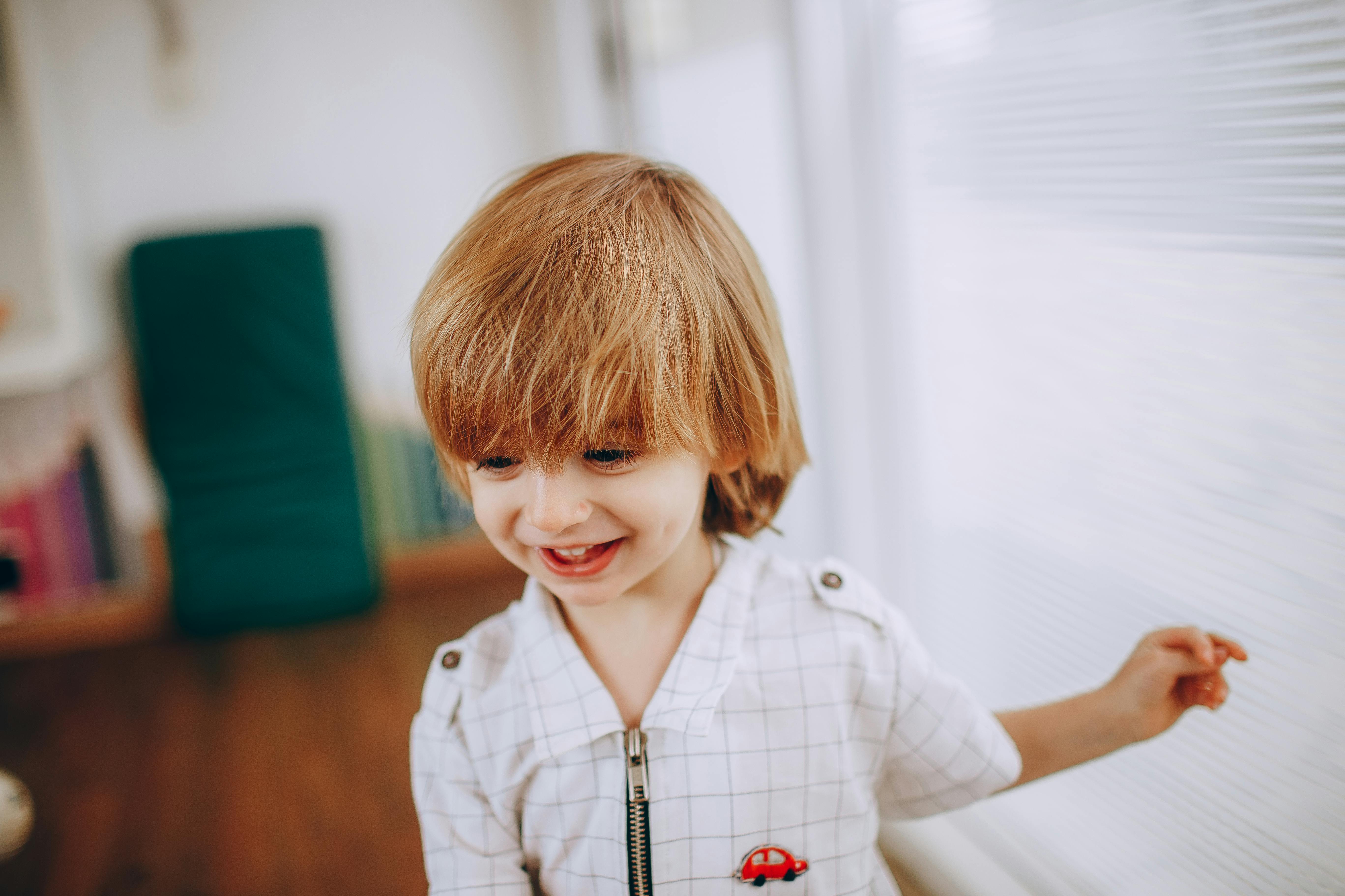 joyful boy in room