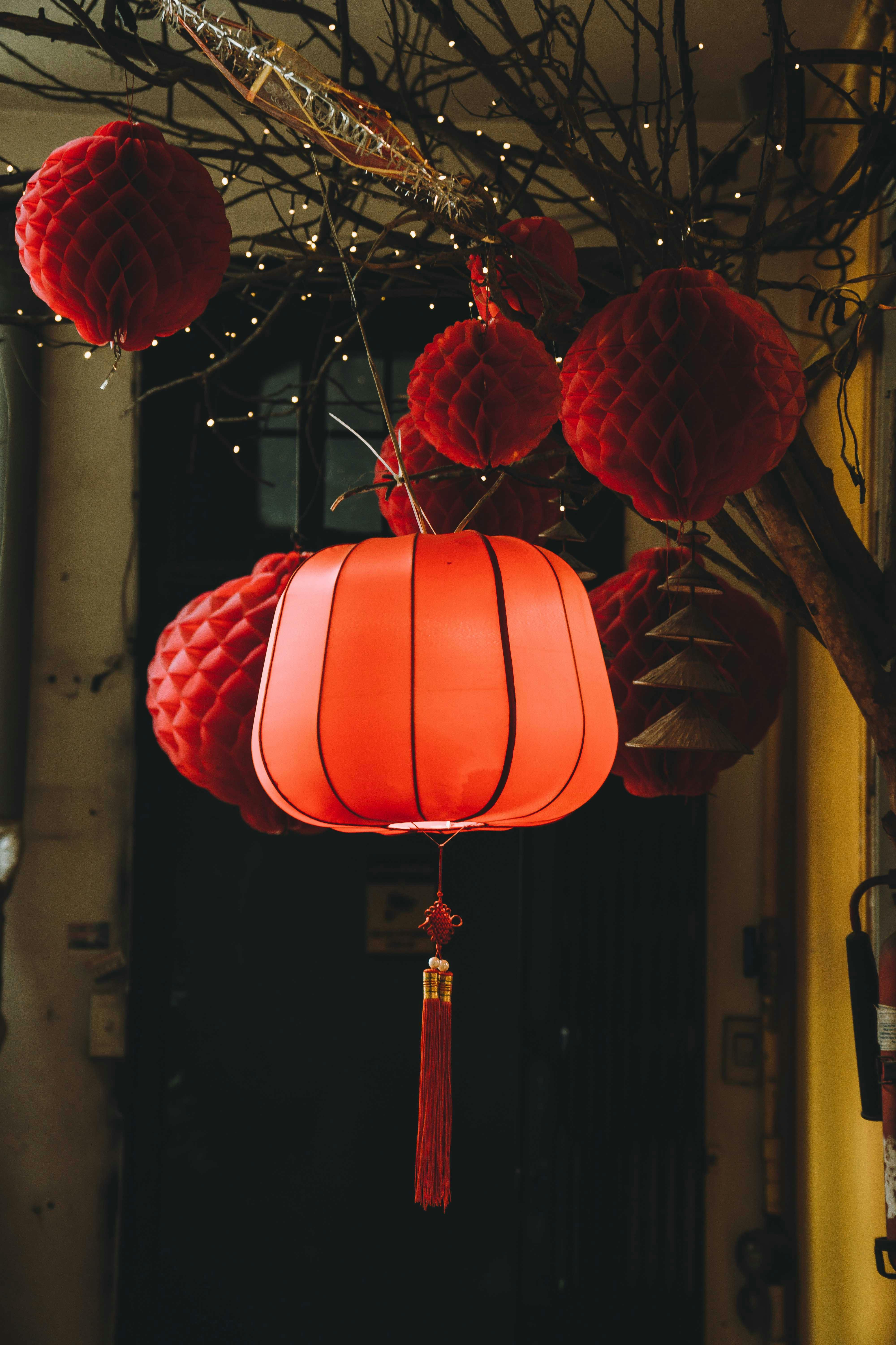 Bright red lanterns hanging outdoors in Ho Chi Minh City, Vietnam capture the festive atmosphere.
