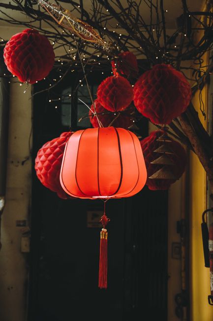 Bright red lanterns hanging outdoors in Ho Chi Minh City, Vietnam capture the festive atmosphere.
