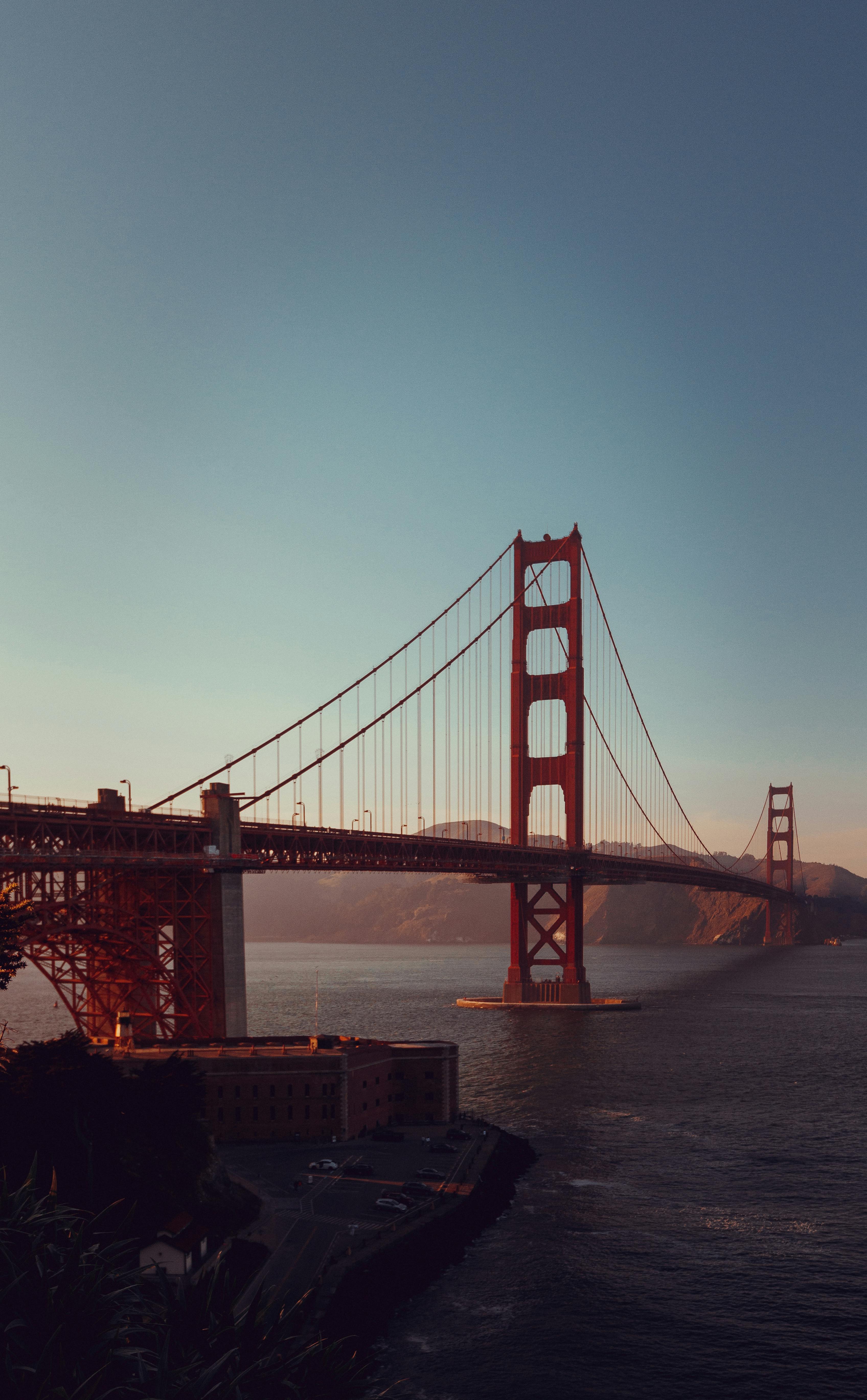 Iconic Golden Gate Bridge set against a twilight sky in San Francisco, CA, USA.