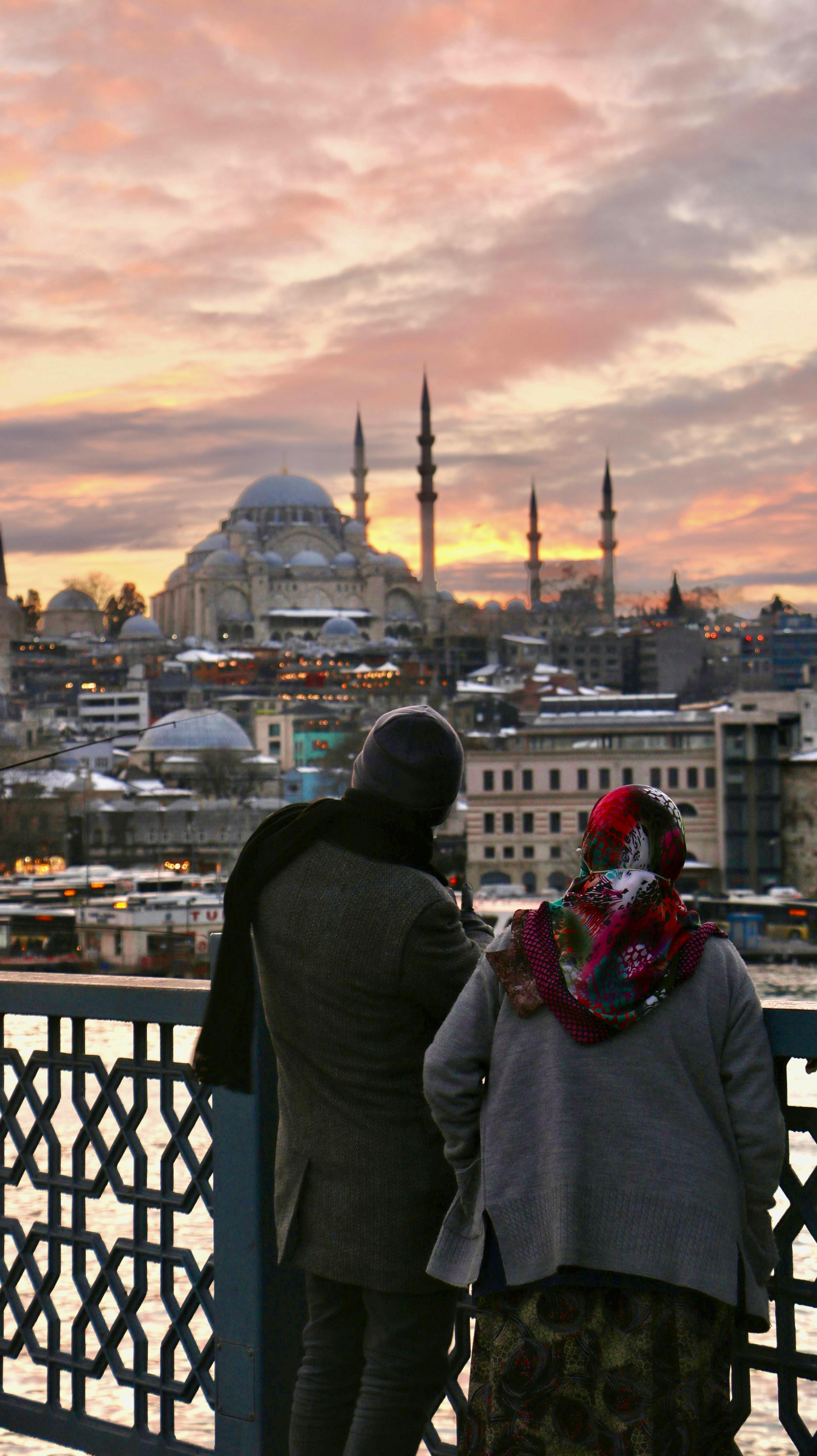 woman and man looking at blue mosque in istanbul turkey