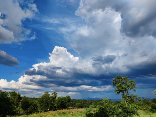 Free Blue Sky and the Hanging Clouds  Stock Photo