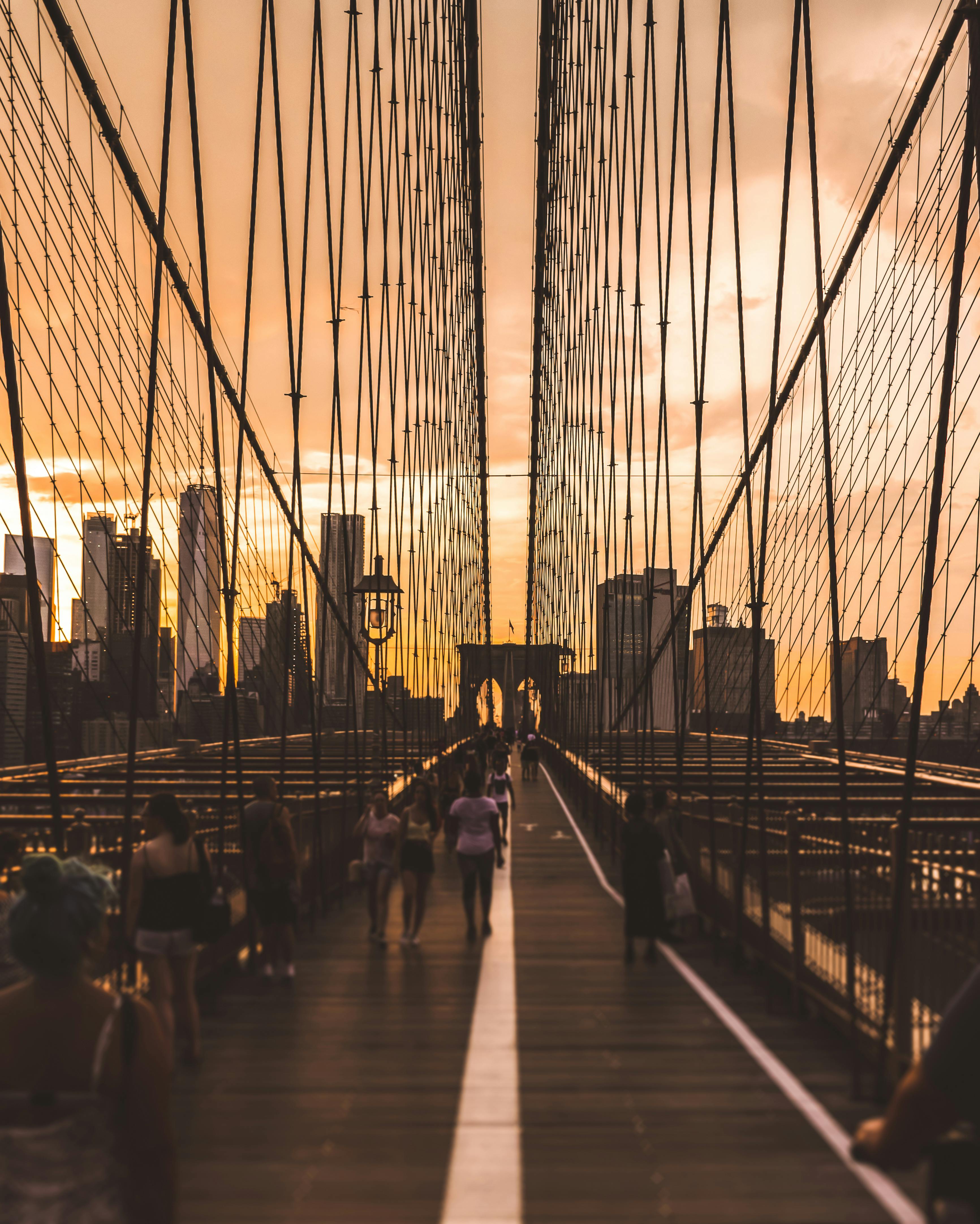 people walking on bridge