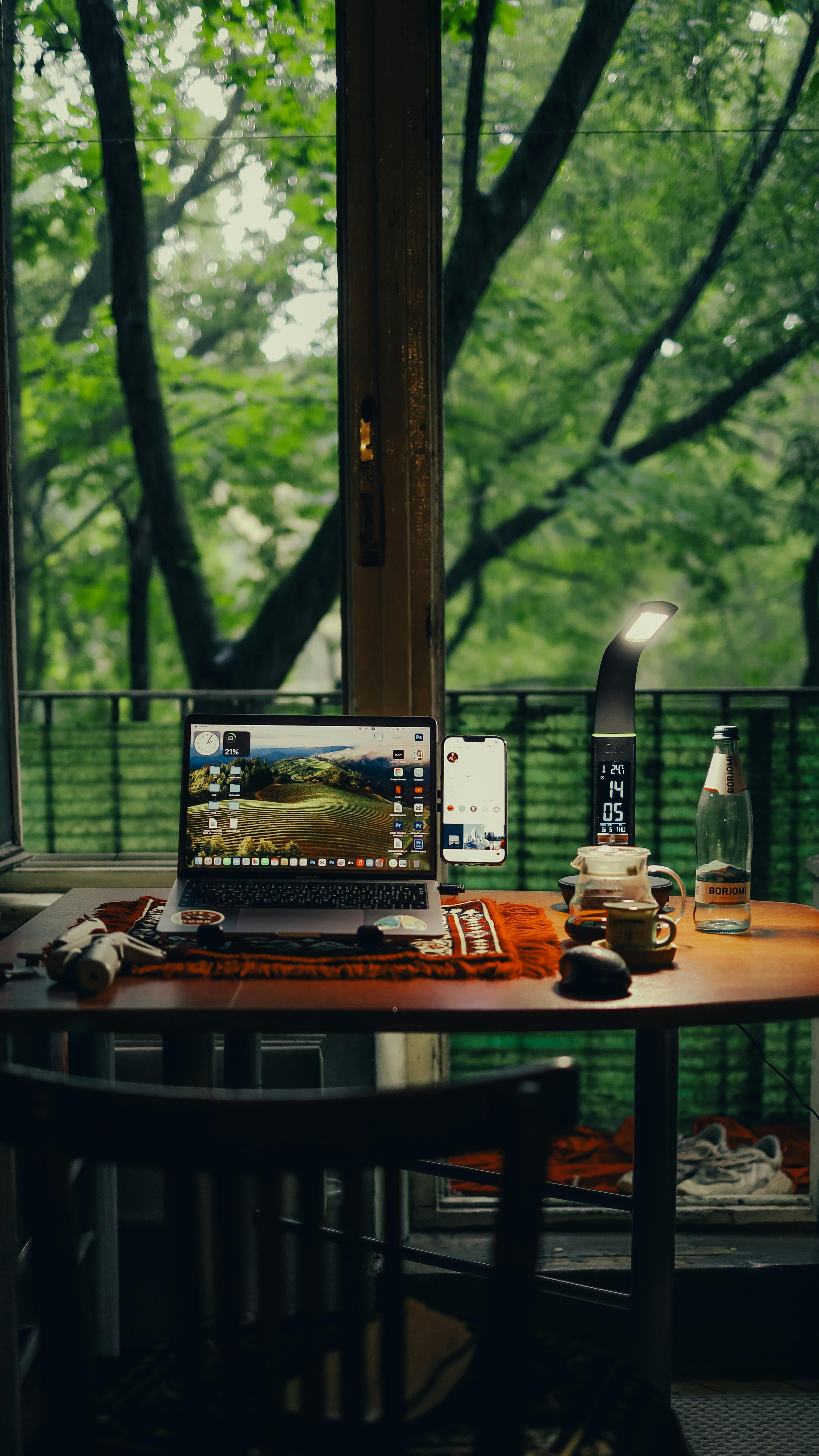 laptop on a table in garden