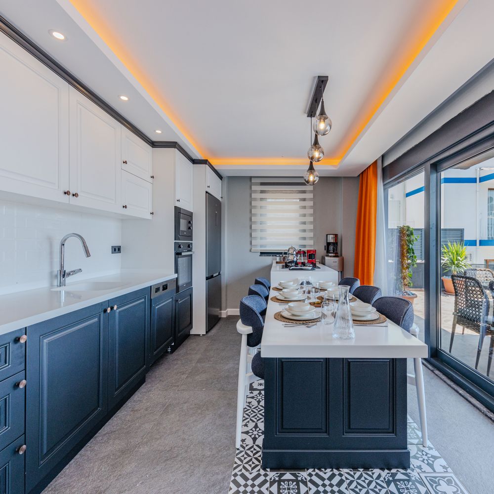 Kitchen Spraying in Barbican — dust sheets down and the room fully protected