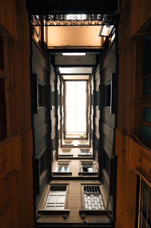 A view of a building from the bottom · Free Stock Photo