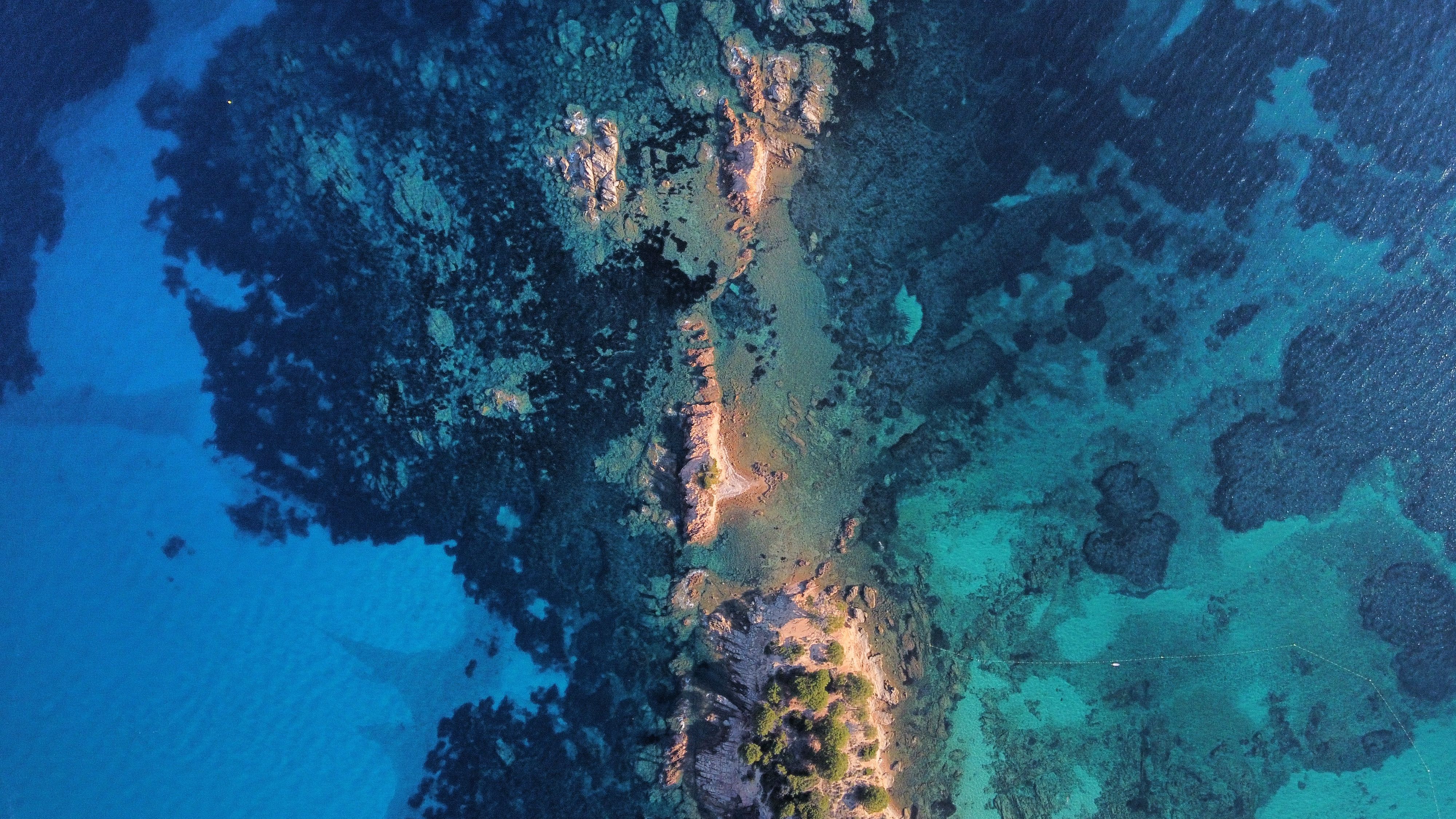 Drone Shot of a Tropical Island among Turquoise Water · Free Stock Photo