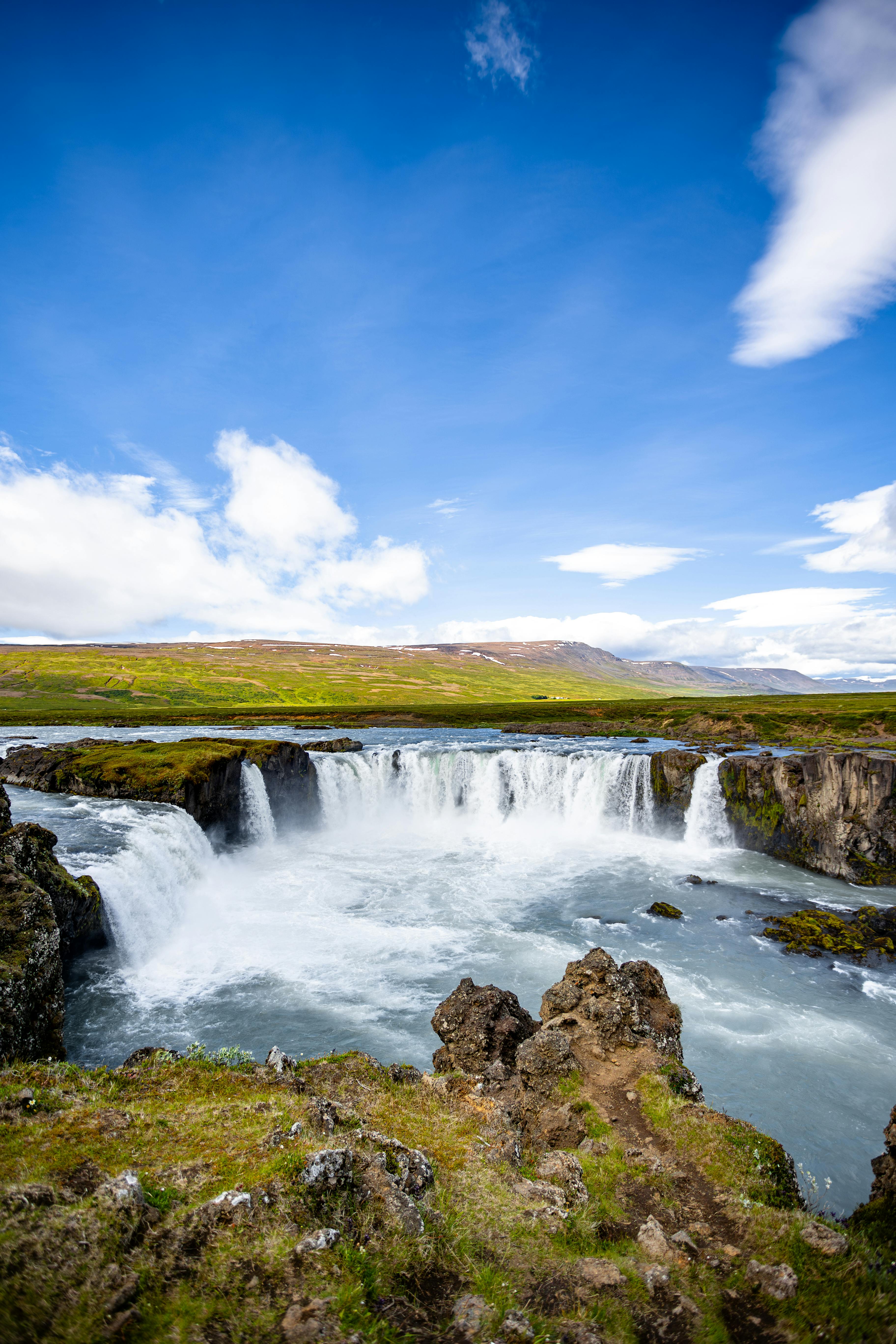 waterfall in the hills of iceland