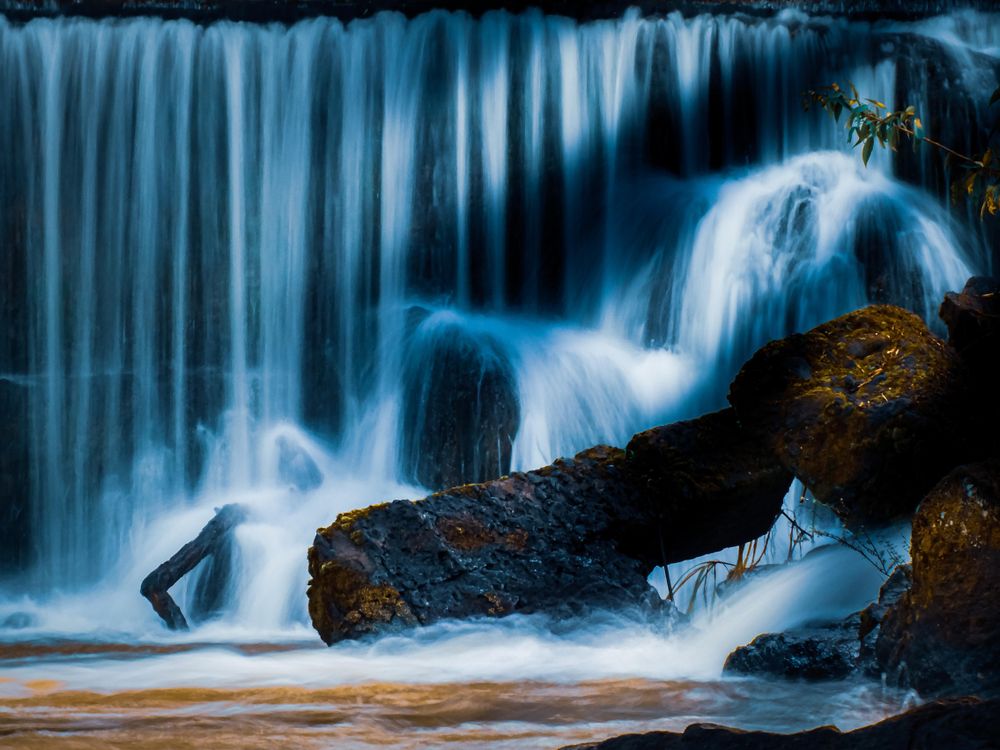 Waterfall Through Rocks Waterfall over Rocks · Free Stock Photo