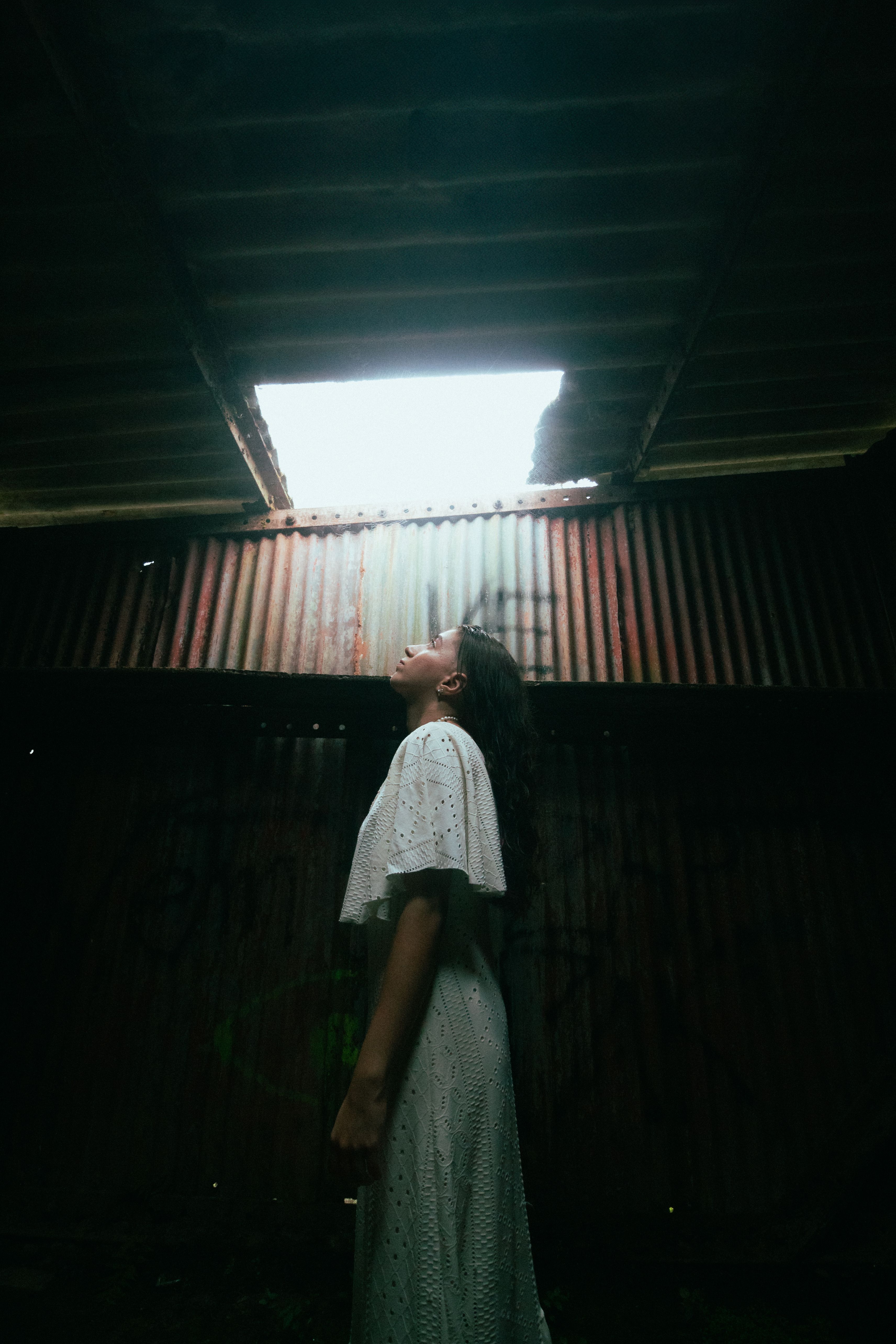 A Woman in a Dark Room · Free Stock Photo