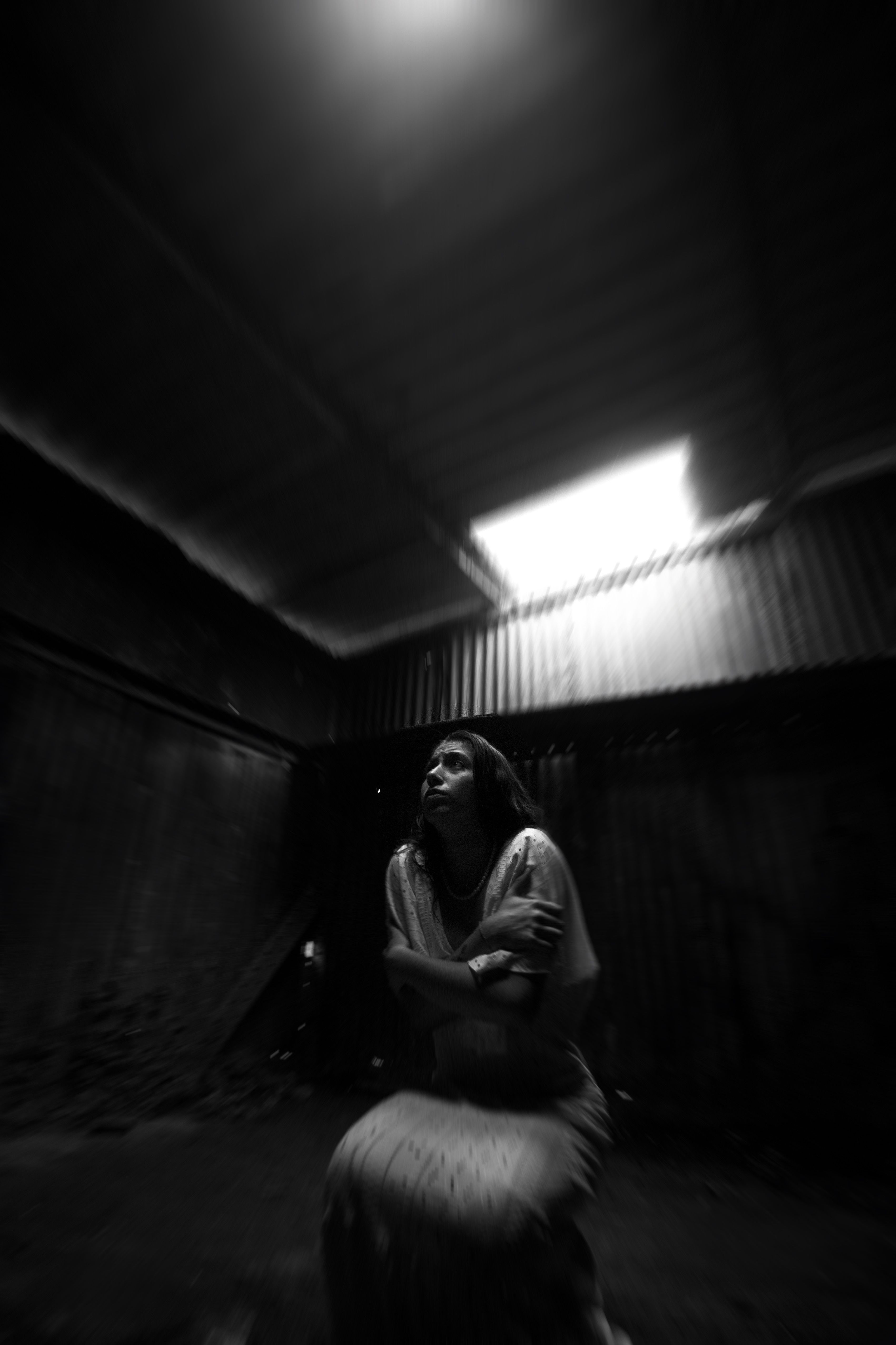 A Woman in a Dark Room · Free Stock Photo