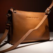 Dark leather satchel — photo by Jose Martin Segura Benites on Pexels