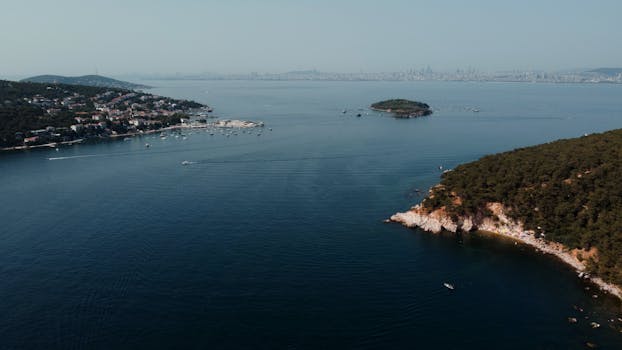 Aerial photography of Heybeliada Island with the Istanbul skyline in the background.