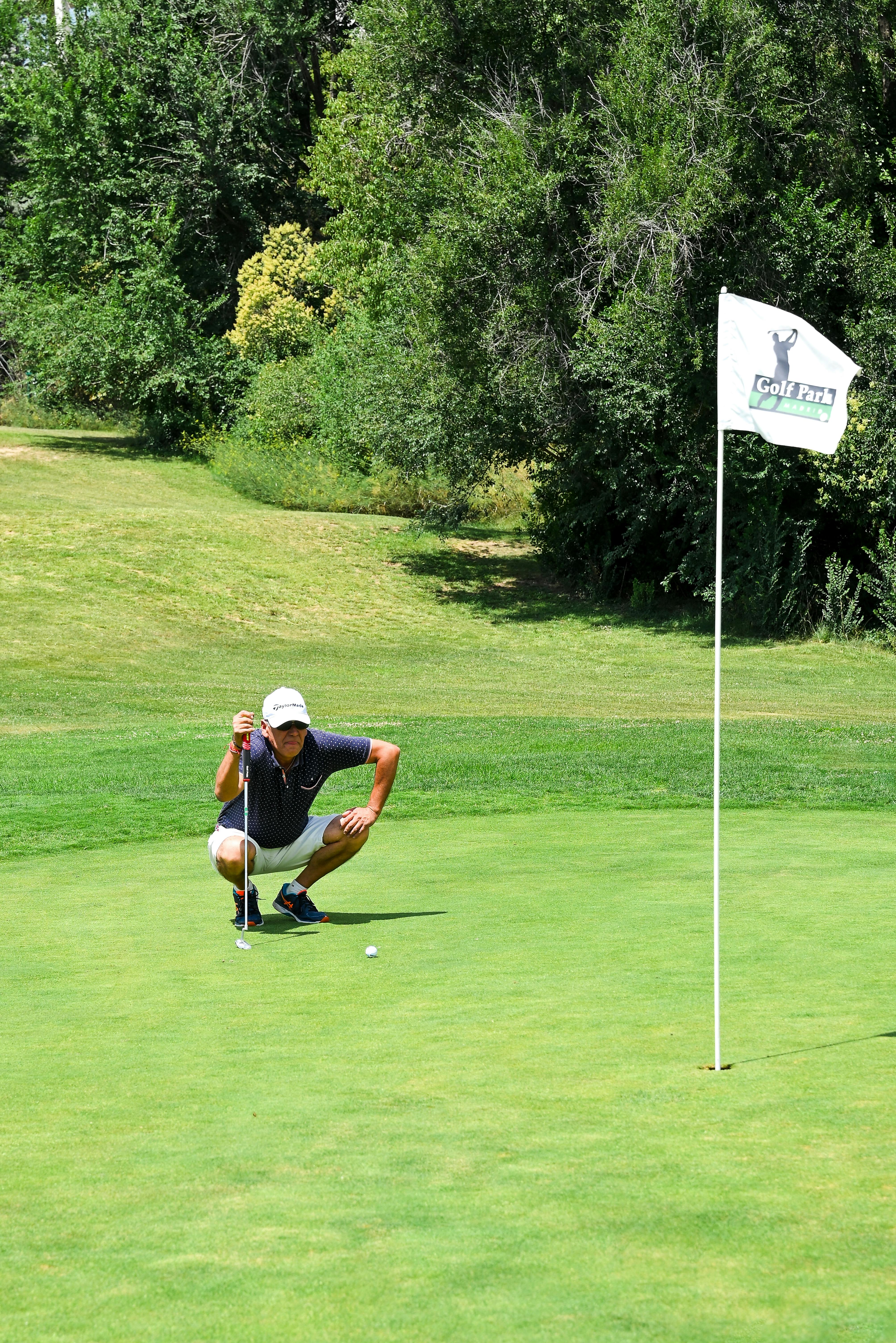 man playing golf on a field