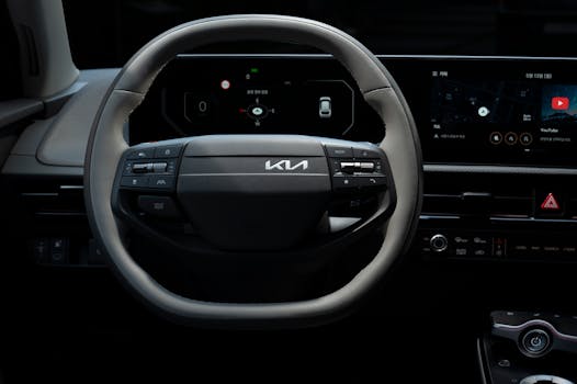 Close-up view of the Kia EV's steering wheel showcasing its modern design and technology.