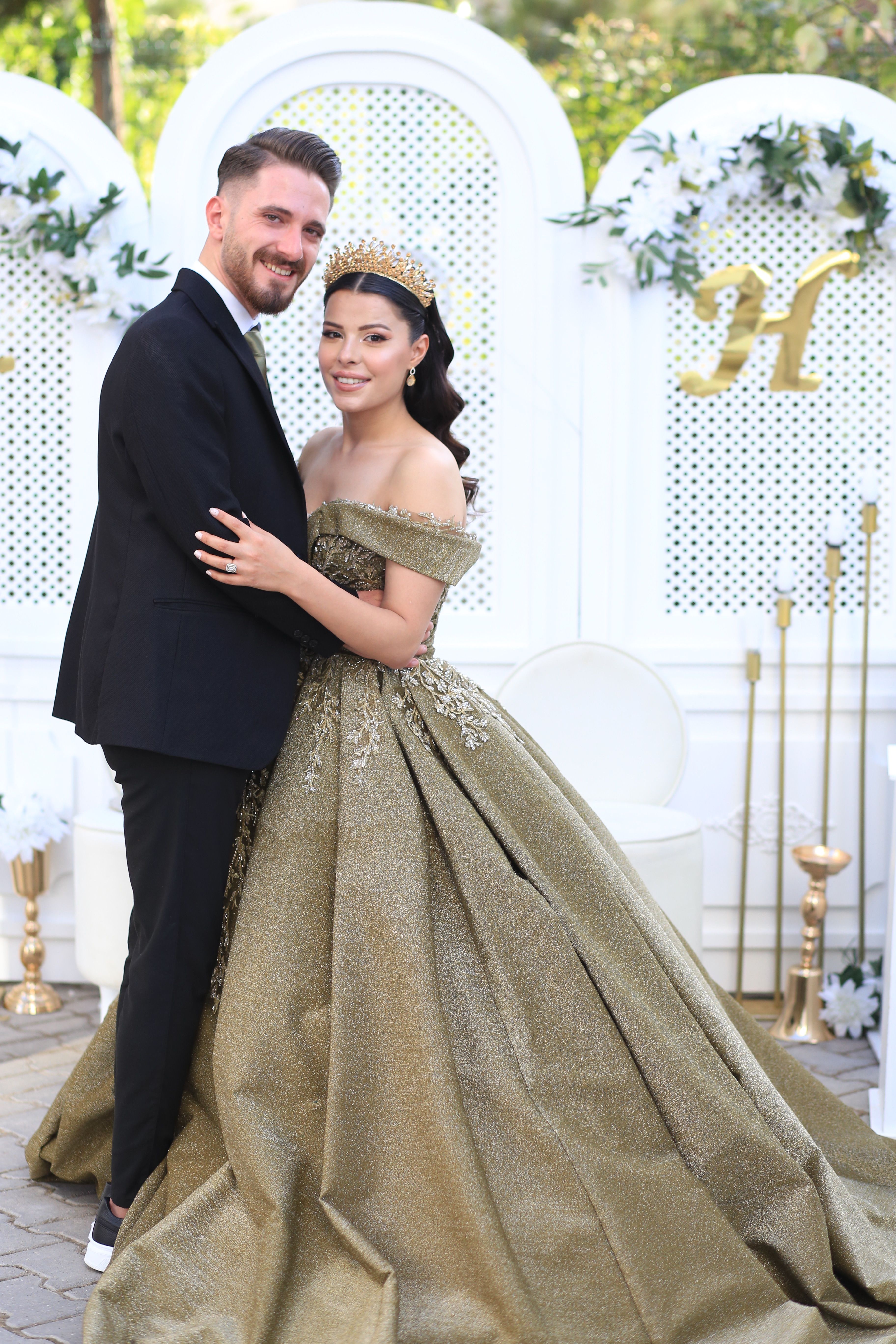 A man and woman in gold wedding dresses · Free Stock Photo