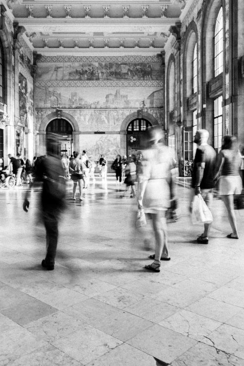 Free Black and white photo of people in motion at São Bento Station, Porto. Stock Photo