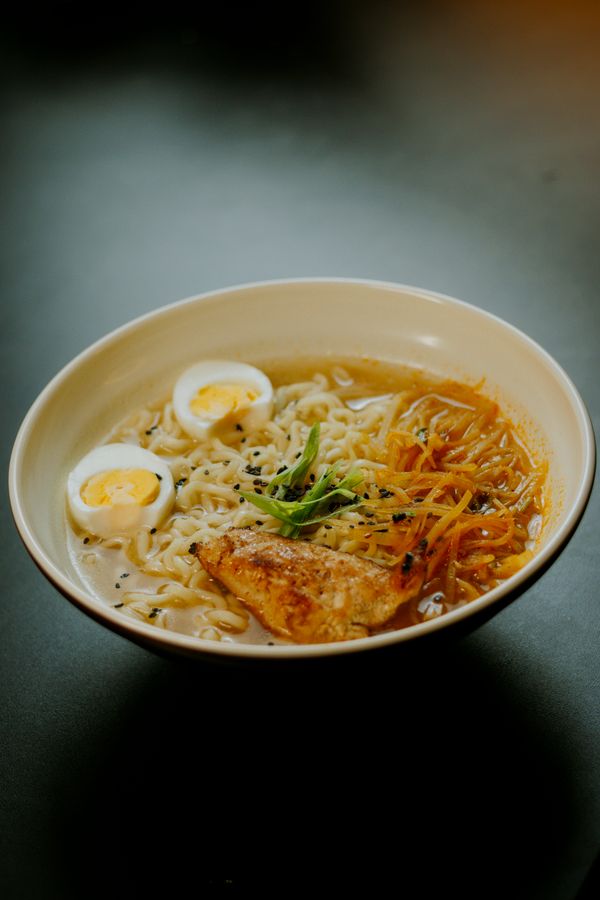 Ramen noodles with soft-boiled eggs Bowl of ramen noodles with soft-boiled eggs in savory broth