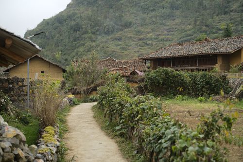 Free Charming rural landscape featuring traditional farmhouses in Ha Giang, Vietnam. Stock Photo
