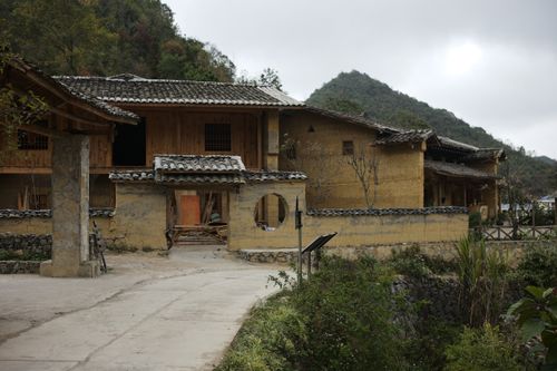 Free Scenic view of traditional Vietnamese houses in Ha Giang surrounded by lush greenery. Stock Photo