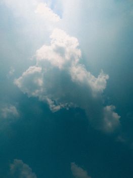 A beautiful capture of white clouds against a bright blue sky, evoking a sense of calm.