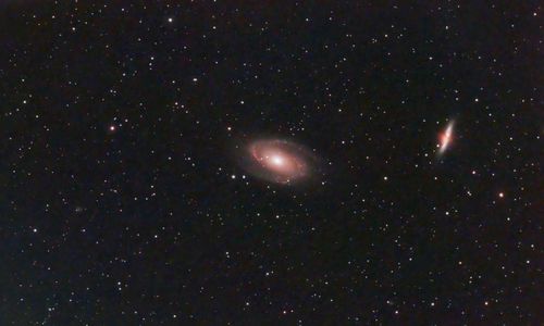 Free Capture of a beautiful spiral galaxy in the starry night sky, showcasing the cosmos' vastness. Stock Photo