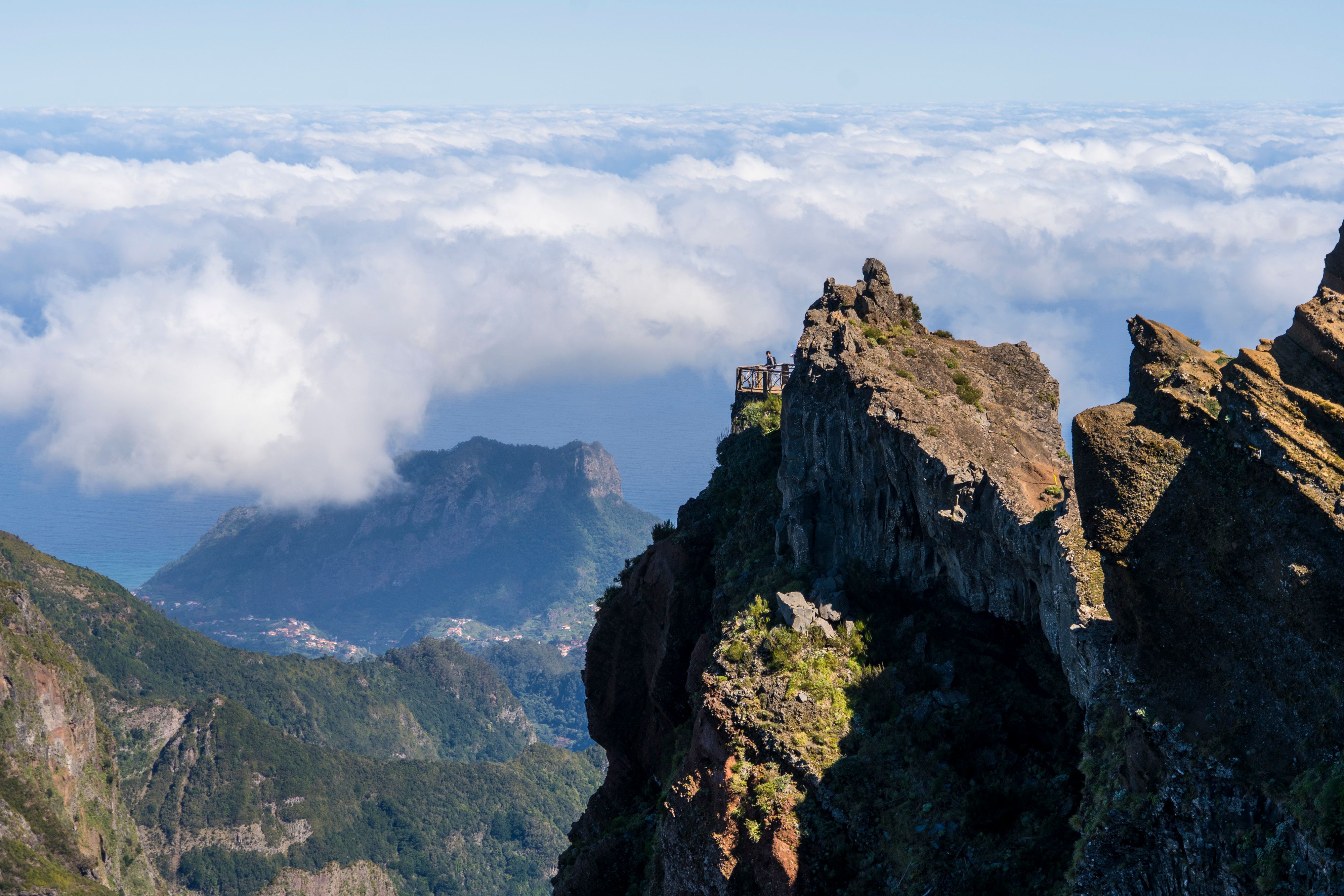 Hiking trail from Pico do Areeiro to Pico Ruivo, Madeira's high mountain peaks above the clouds