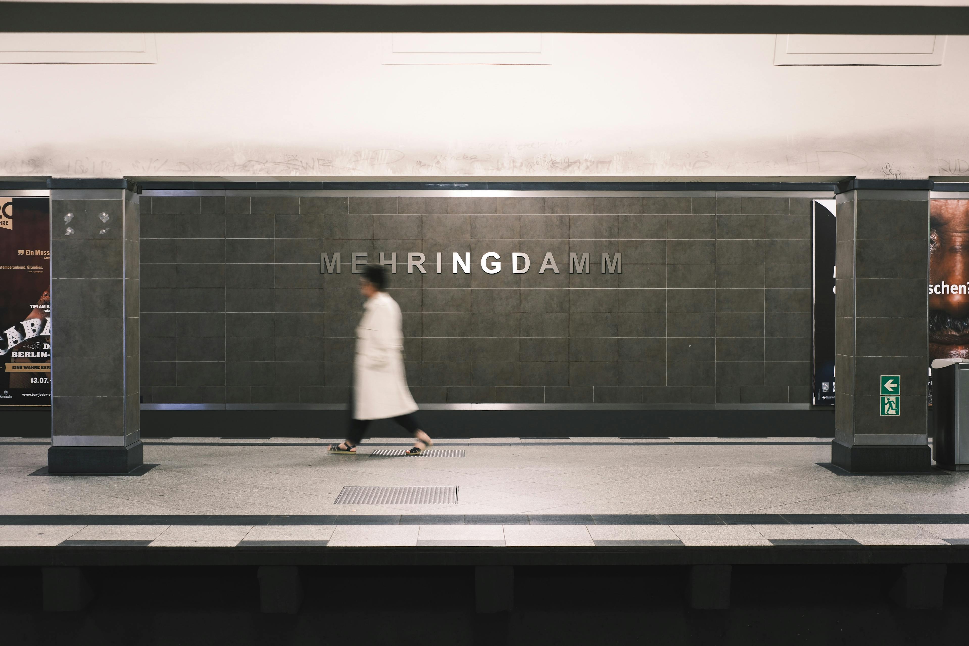 person walking at mehringdamm station in berlin