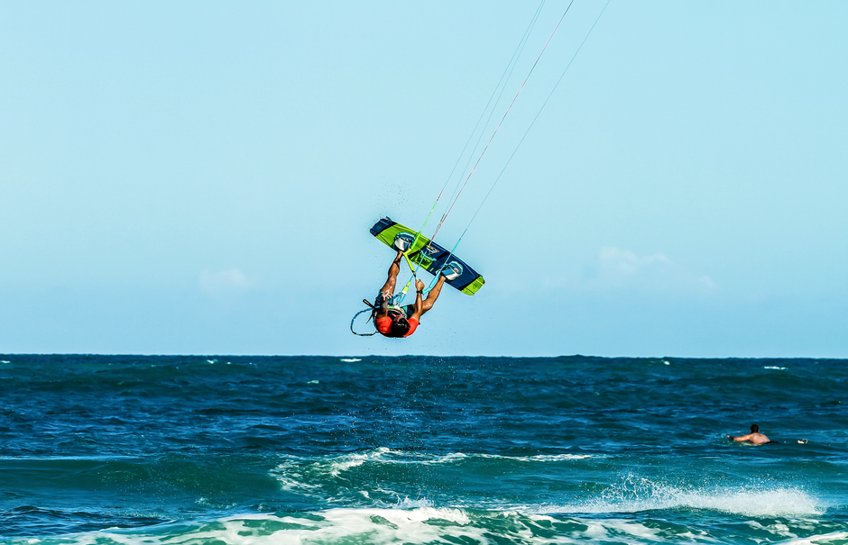 Dynamic kitesurfing action captured on the beautiful coast