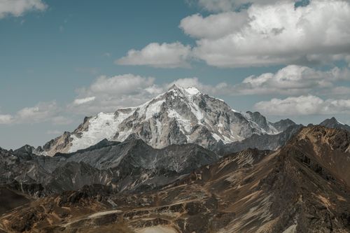 Free A breathtaking view of the snow-capped Condoriri mountain in the Andes, showcasing nature's raw beauty. Stock Photo
