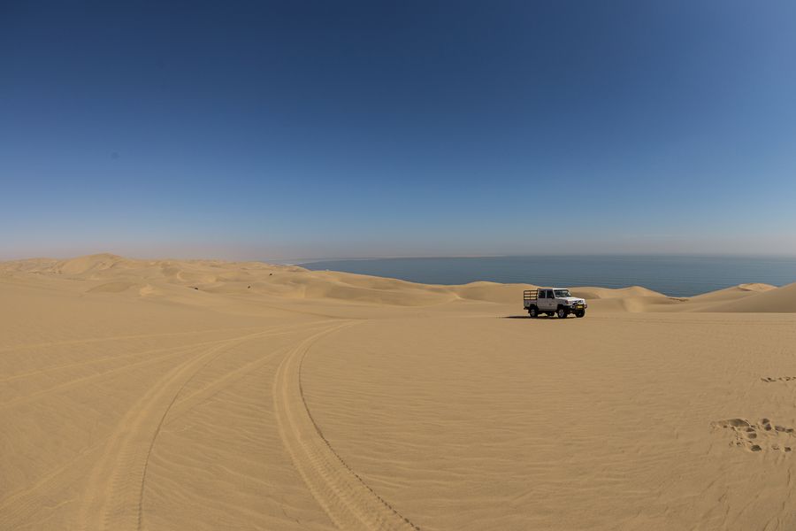 4x4 vehicle crossing dunes in Namibia