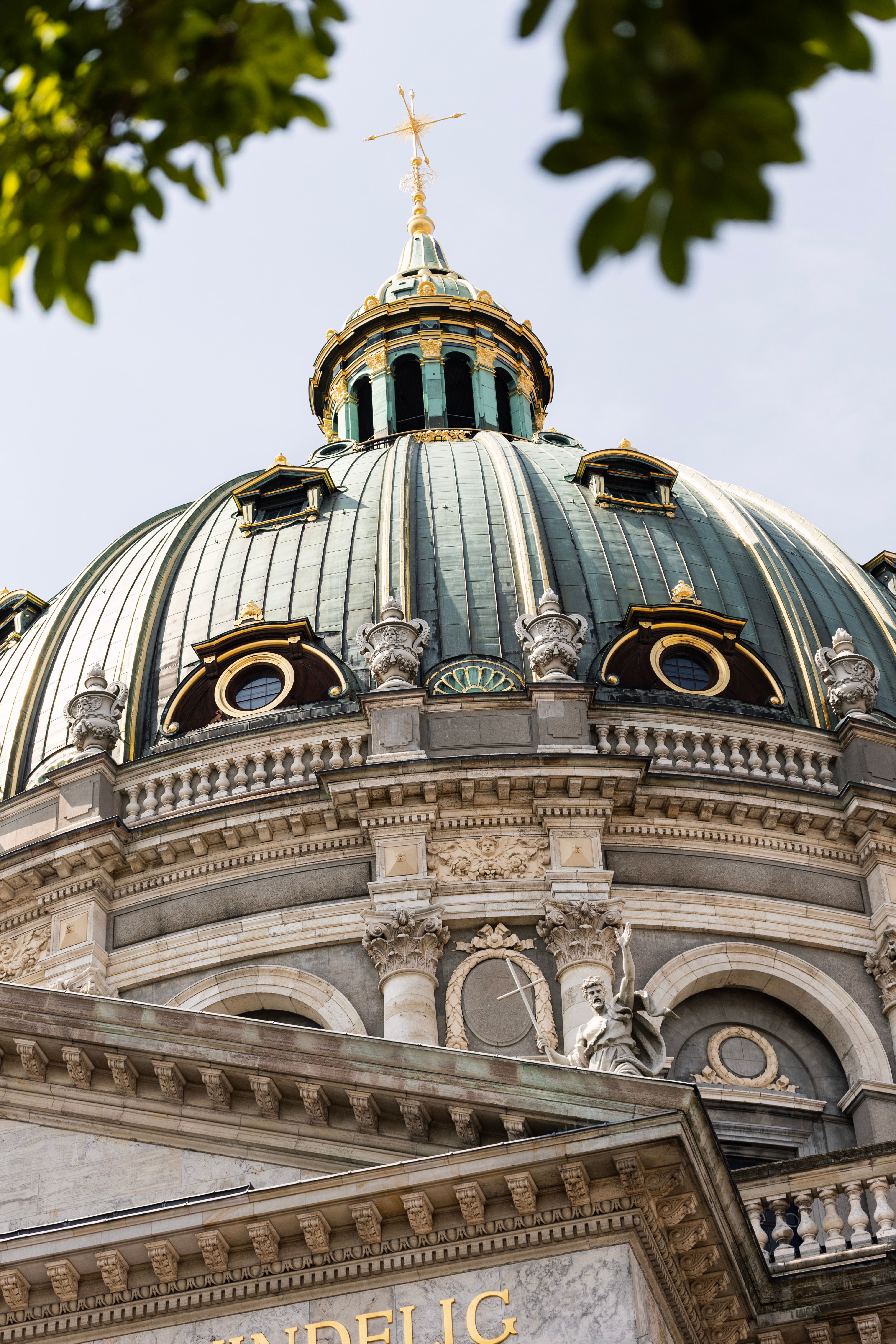Close-up of the ornate dome of Frederik's Church in Copenhagen, capturing its architectural elegance.