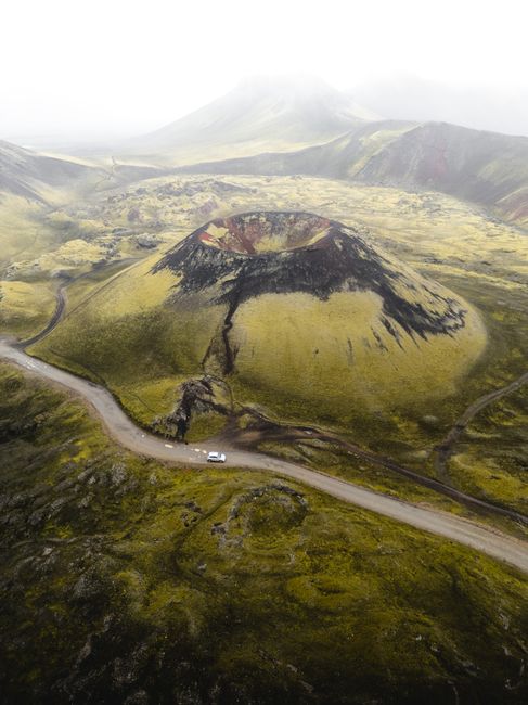 Stunning aerial view of Grábrók Crater in Iceland's volcanic landscape, captured during the day.