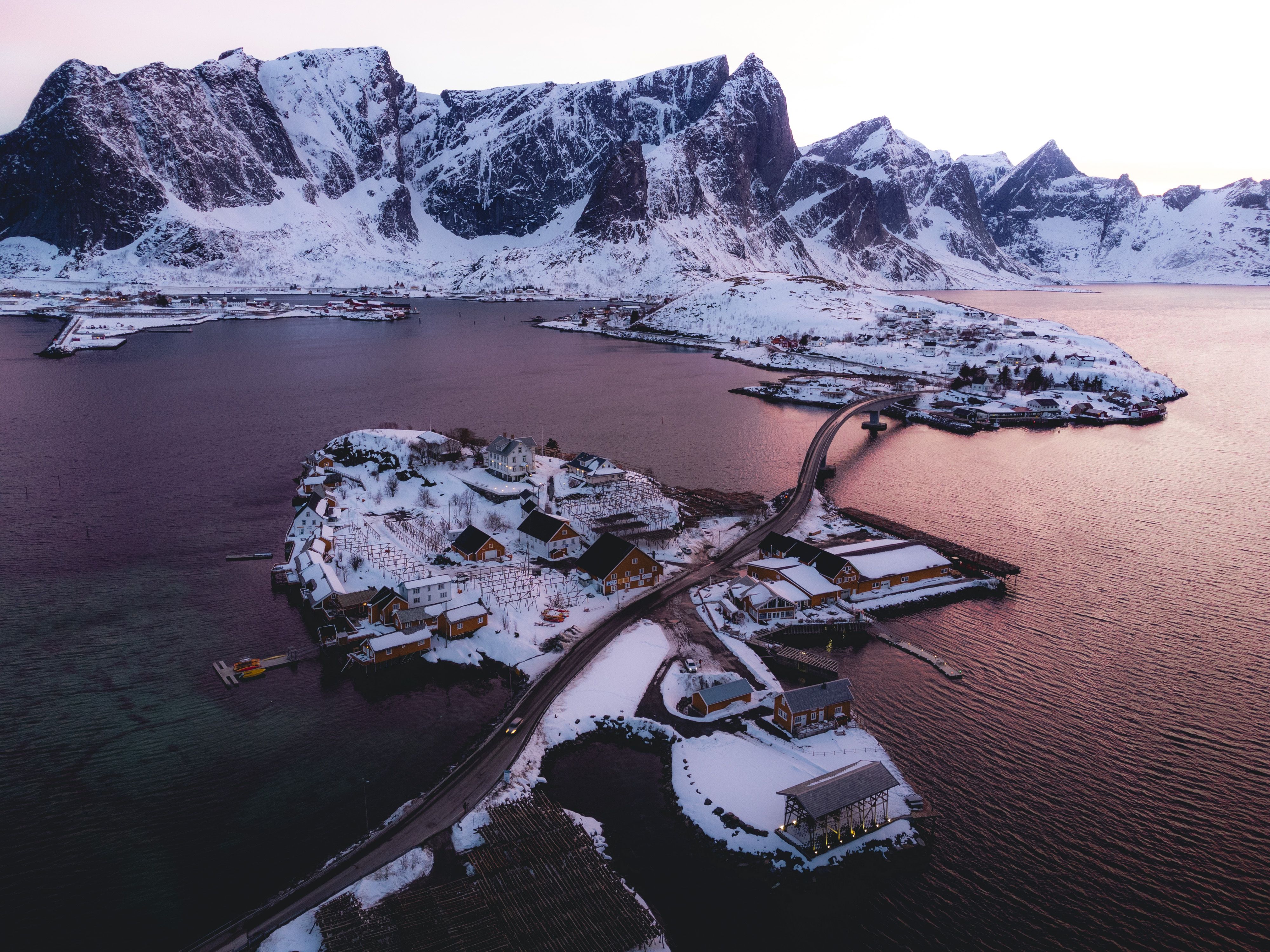 Unforgettable Helicopter Over Trolltunga and Waterfall Sightseeing from Bergen Review Review 2026 - Beautiful aerial view of Moskenes, Norway, showcasing snowy landscapes and mountains during winter.