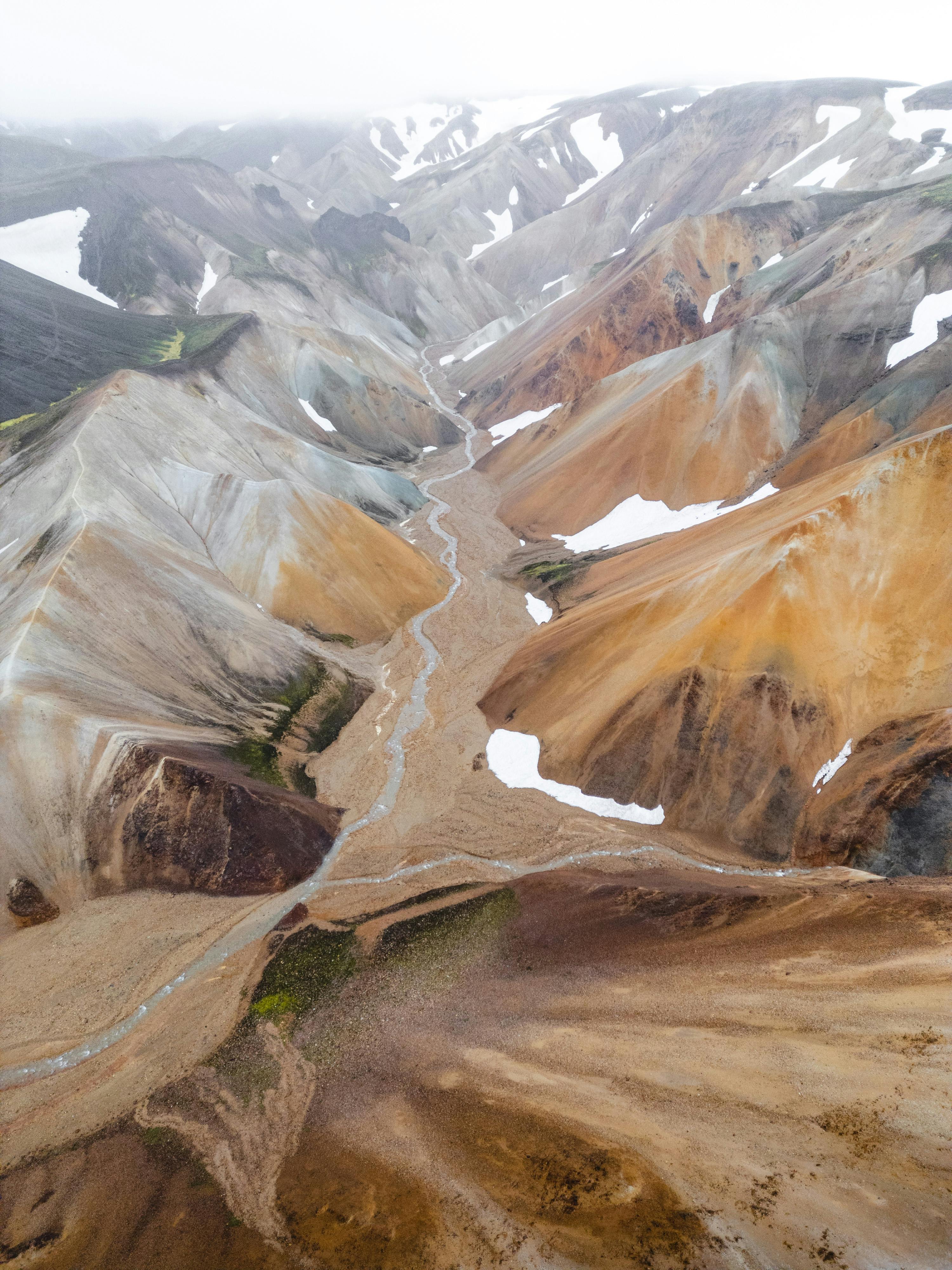 Stunning aerial shot of Iceland's colorful rhyolite mountains in Landmannalaugar.