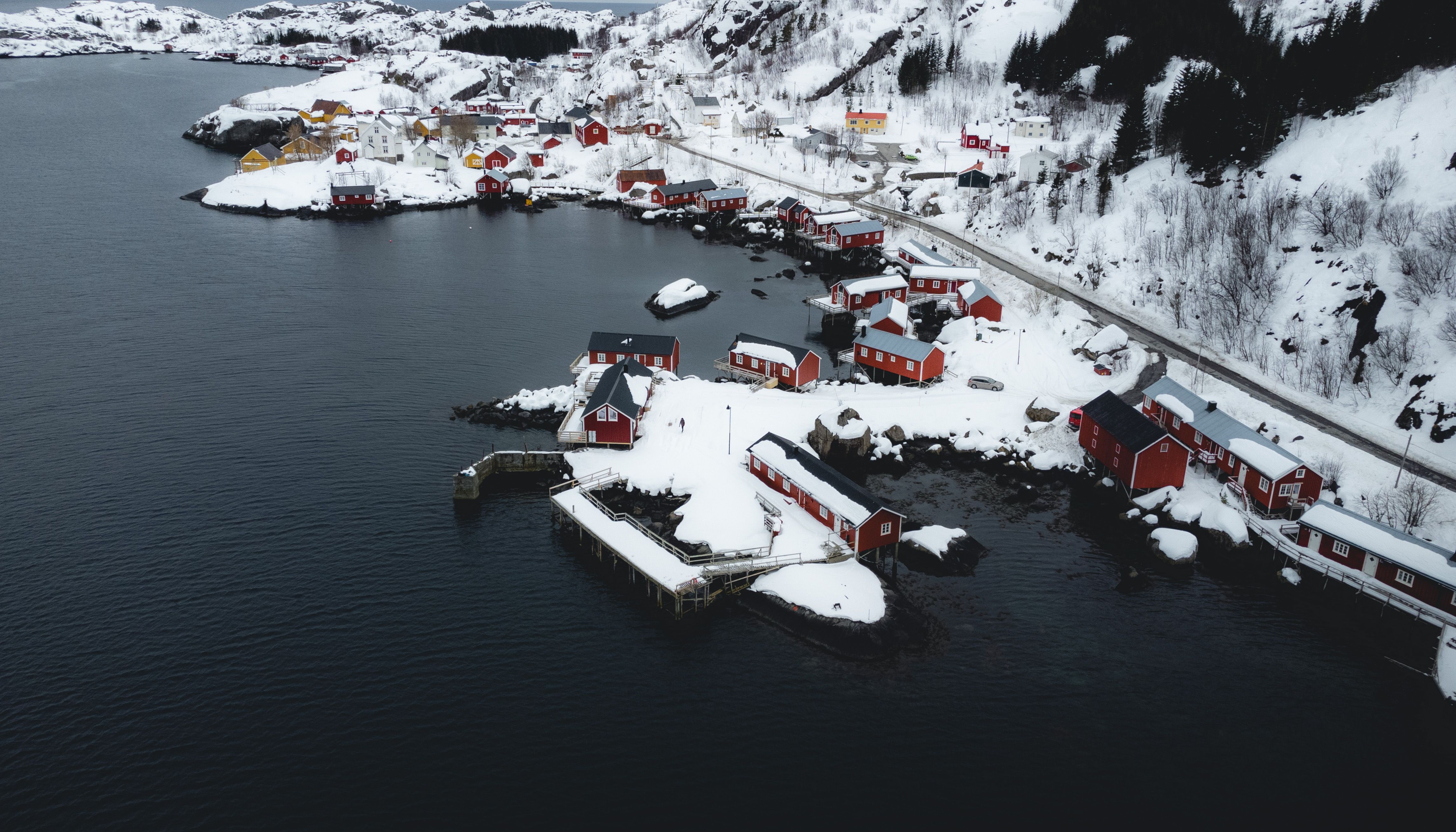 An aerial view of a small village in the snow · Free Stock Photo