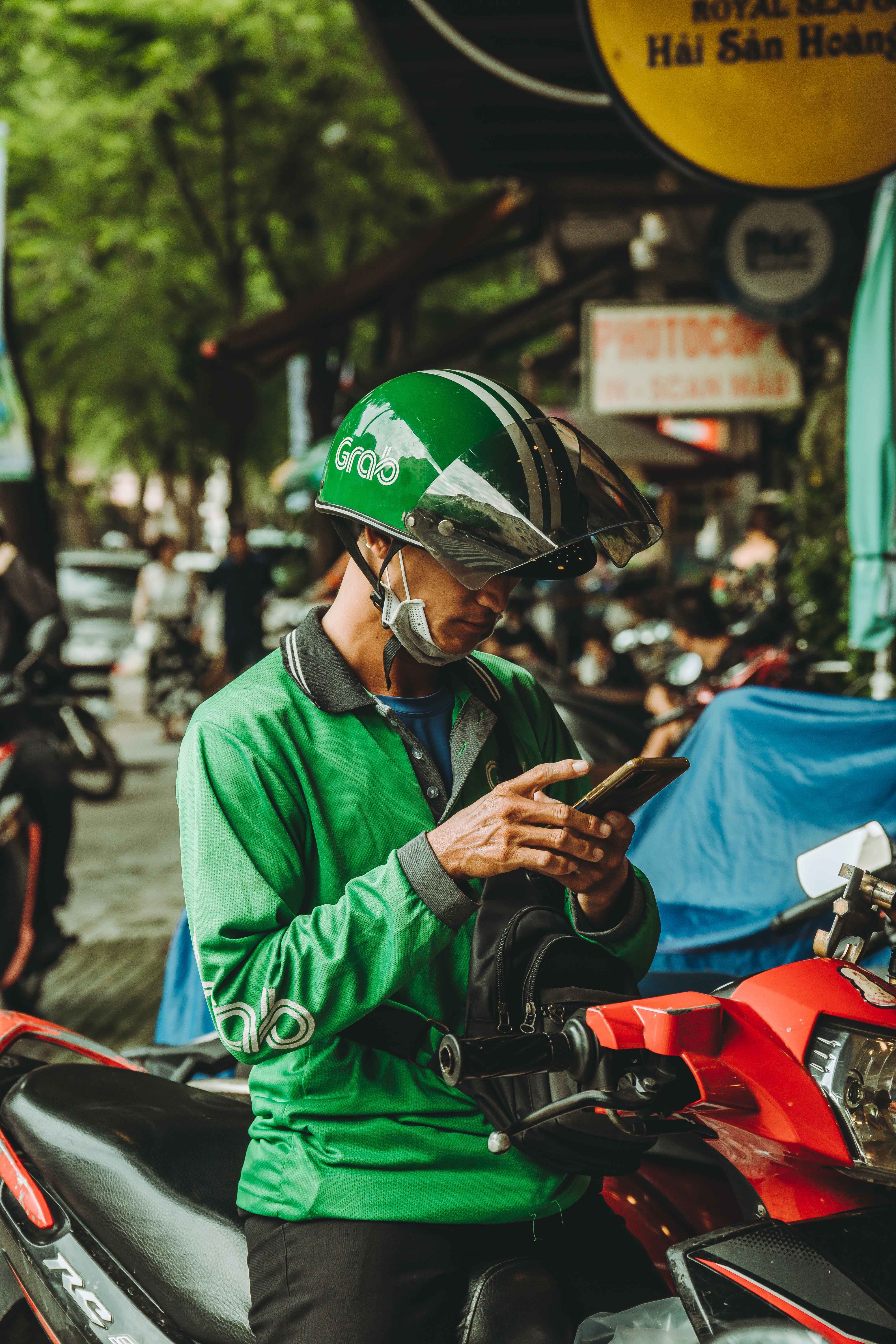 Booking a GrabCar ride in Vietnam. Booking a GrabCar ride in Vietnam.
