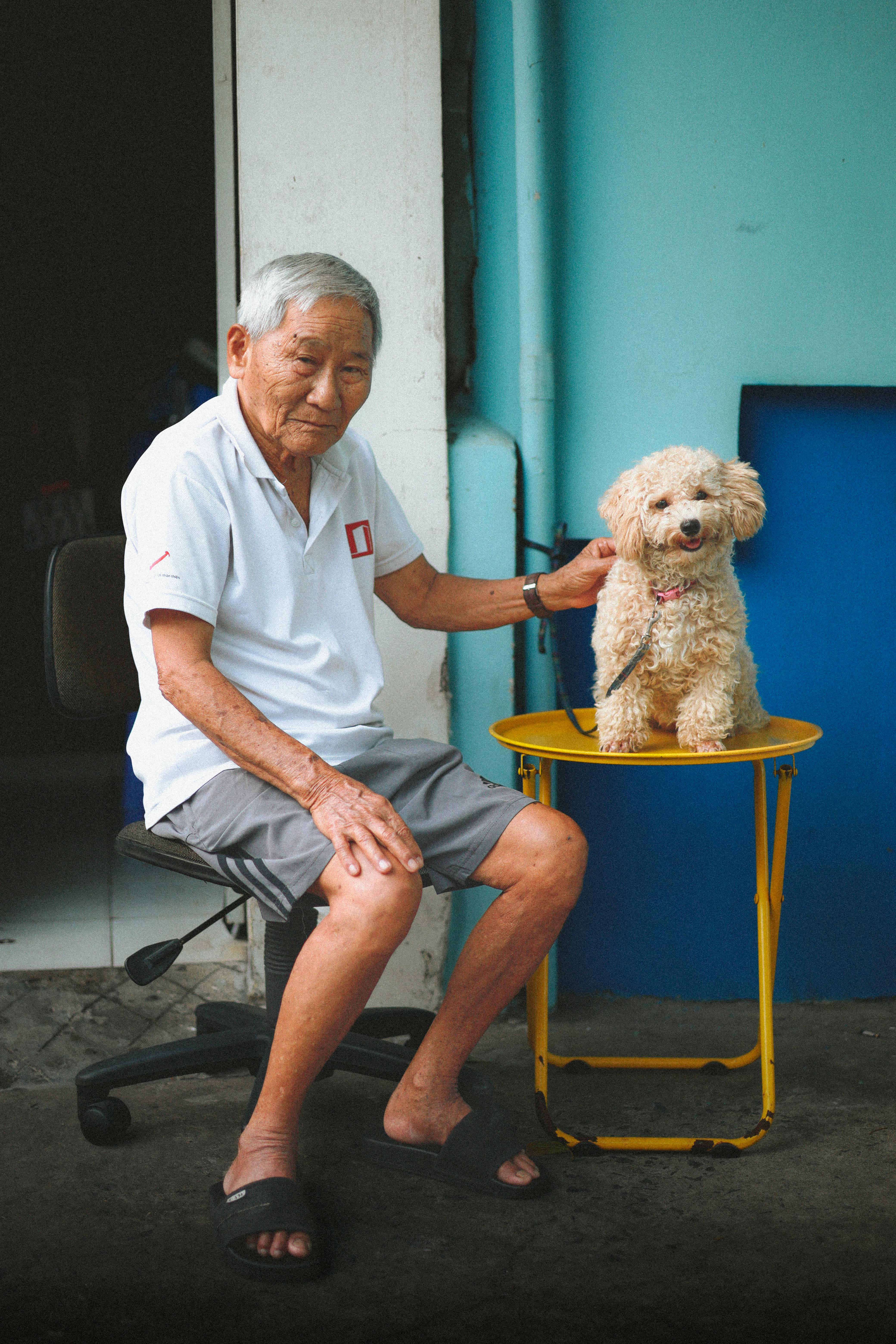 man with his poddle