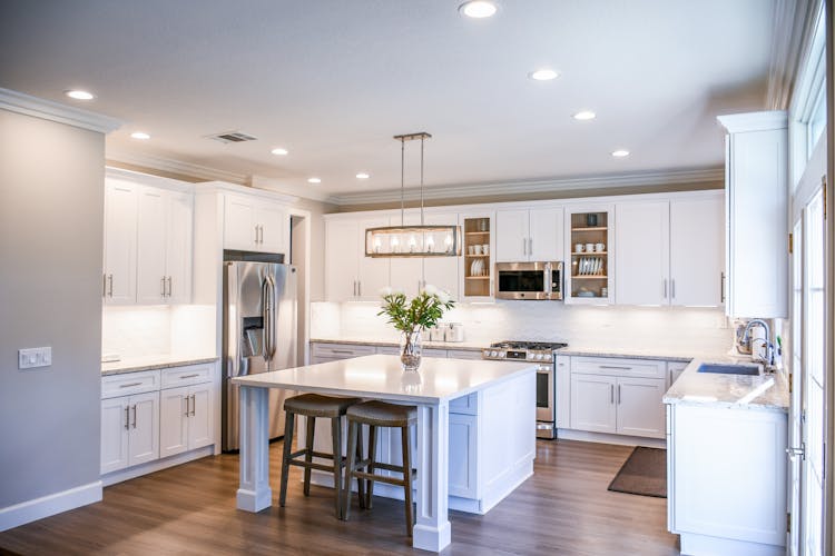 Kitchen With Furniture And Appliances