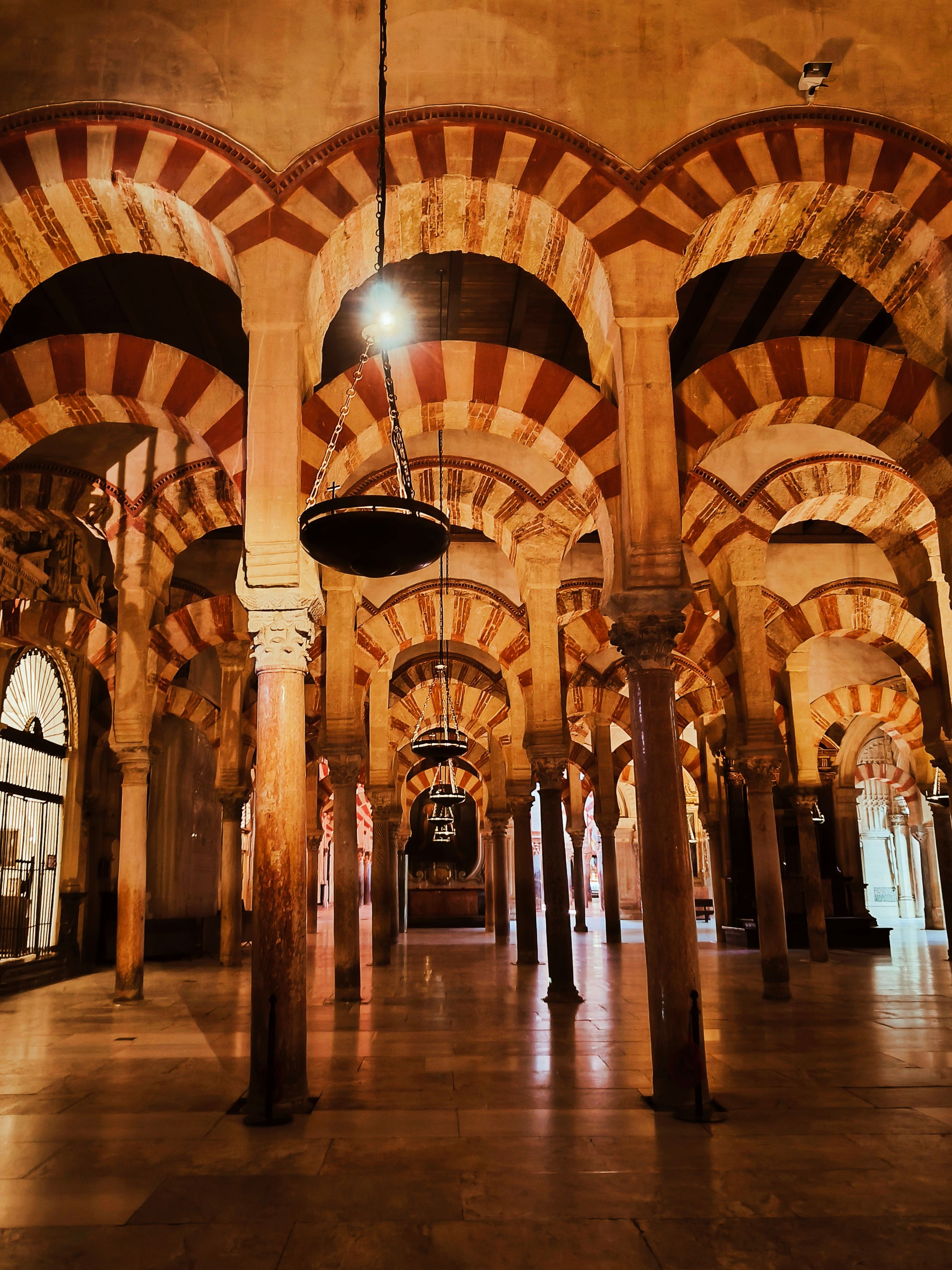 The breathtaking historic Islamic arches of the Great Mosque of Cordoba in Andalusia Spain for a multi city Umrah stopover holiday