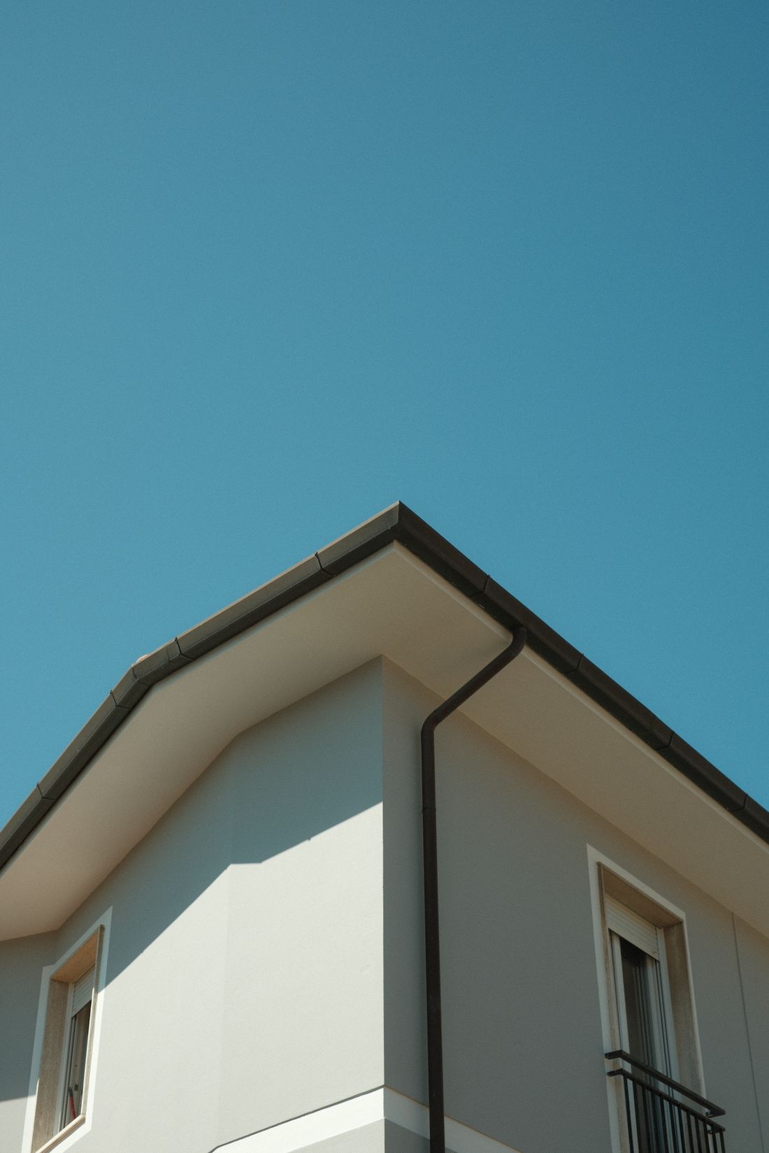 Fascia board and gutter along the edge of a roof overhang