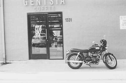 Grayscale Photography of Genisia Coffee Shop
