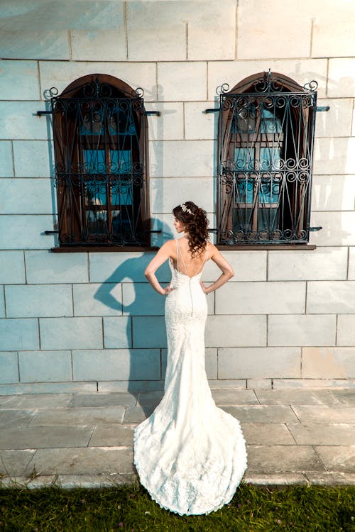 Woman Standing in Front of Wall